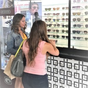 Models trying on sunglasses for a Condo commercial