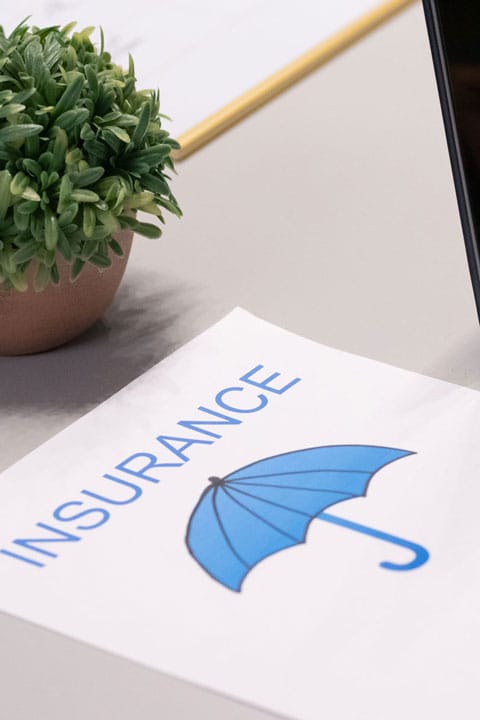 Direct insurance billing picture with the word insurance and an umbrella