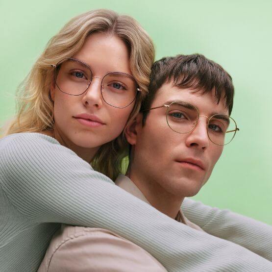 photo of two models wearing Andy Wolf prescription eyeglasses