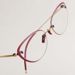 rimless glasses with custom ruby trim